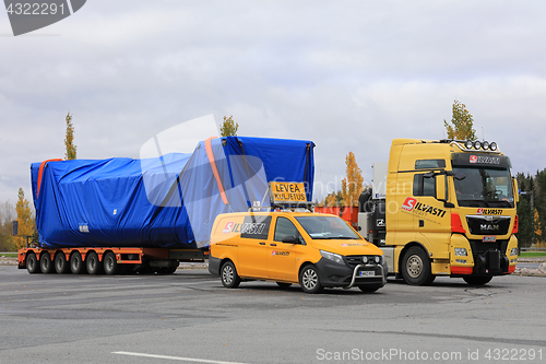 Image of Wide Load Transport with Pilot Vehicle