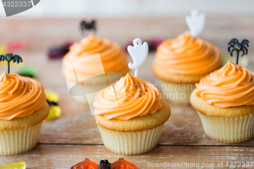 Image of halloween party cupcakes or muffins on table