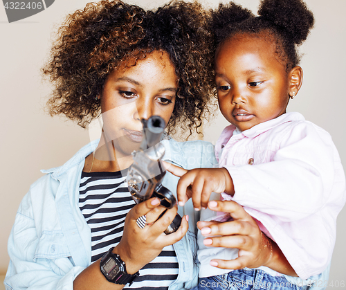 Image of adorable sweet young afro-american mother with cute little daugh