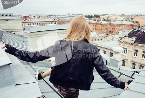 Image of two cool blond real girls friends making selfie on roof top, lifestyle people concept, modern teens