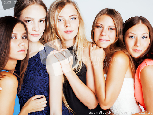 Image of many girlfriends hugging celebration on white background, smilin