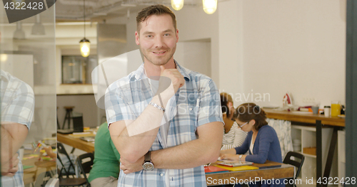 Image of Smiling male employee posing