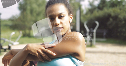 Image of Beautiful woman stretching hands