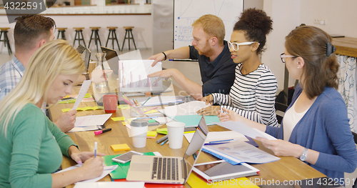 Image of Group of people working at desktop