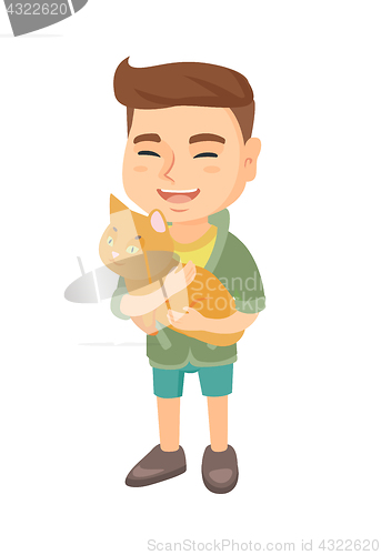 Image of Caucasian happy boy holding a cat.