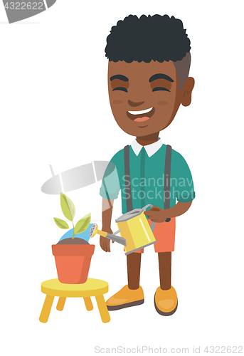 Image of African boy watering plant with a watering can.