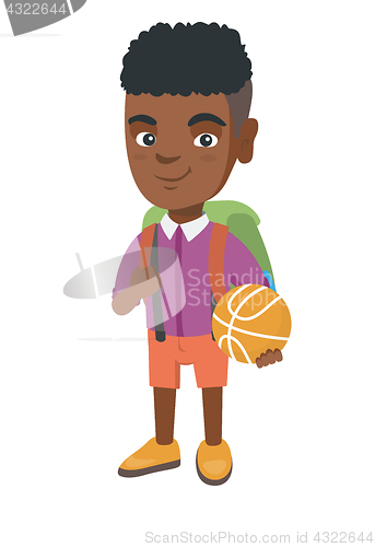 Image of Schoolboy with backpack holding a basketball.