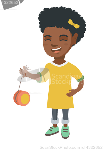 Image of African-american girl playing with yo-yo.