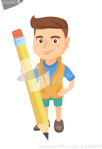 Image of Caucasian kid boy standing with a huge pencil.