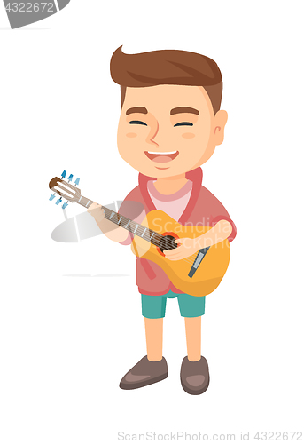 Image of Caucasian boy singing and playing acoustic guitar.