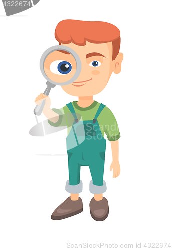 Image of Caucasian boy looking through a magnifying glass.