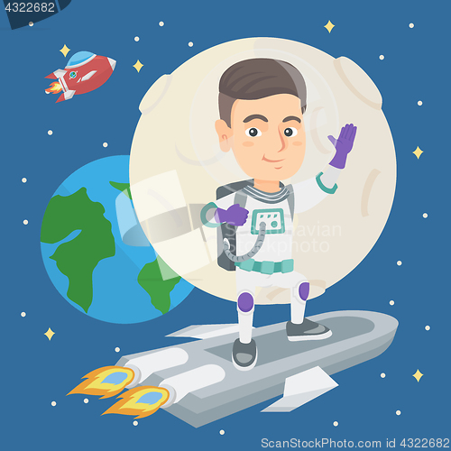 Image of Caucasian smiling boy riding a space rocket.