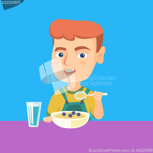 Image of Caucasian boy eating porridge for breakfast.