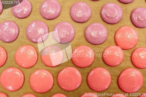 Image of macaron batter or meringue cream on baking paper