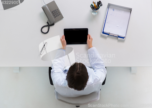 Image of doctor with tablet pc at clinic