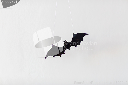 Image of halloween decoration of bat over white background