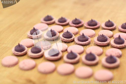 Image of macarons on table at confectionery or bakery