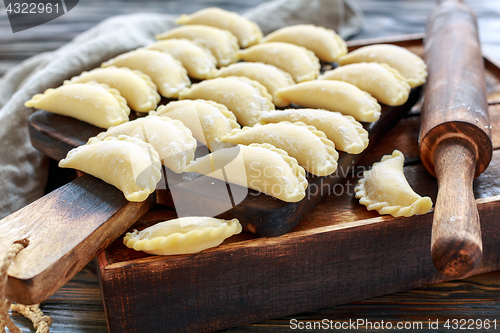 Image of Ready for cooking dumplings with cottage cheese.