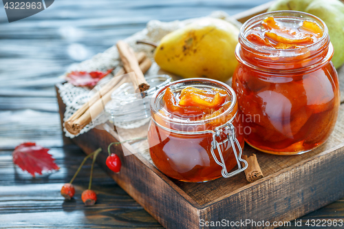 Image of Homemade jam from pears in glass jars.