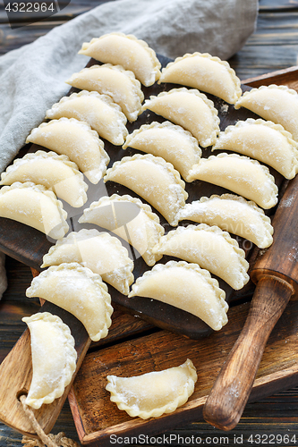 Image of Homemade dumplings with cottage cheese for cooking.
