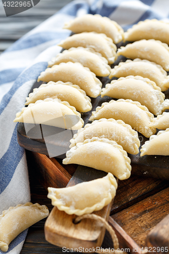 Image of Pierogi with cottage cheese prepared for cooking.