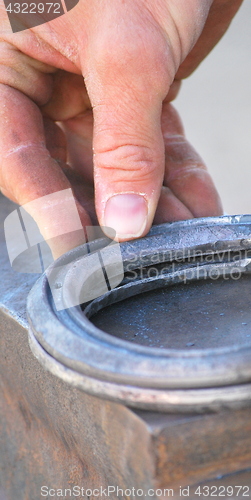 Image of Male farrier.