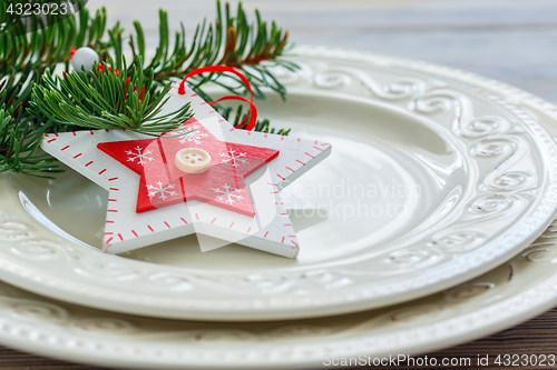 Image of Christmas decor on a white porcelain plate.