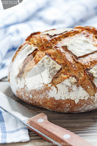 Image of Homemade sourdough bread from wheat and rye flour closeup.