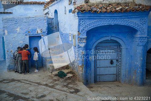 Image of Kids in Chefchaouen, the blue city in the Morocco.