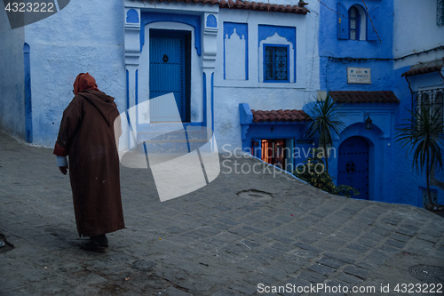 Image of Man in Chefchaouen, the blue city in the Morocco.