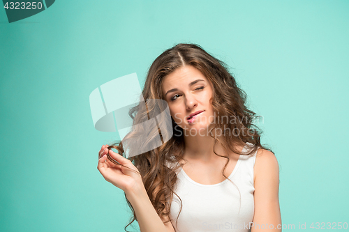 Image of The young woman\'s portrait with sad emotions
