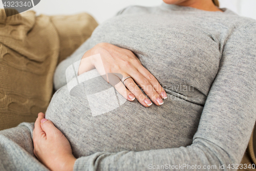 Image of close up of pregnant woman with big belly