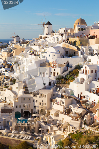 Image of Oia village at sunset, Santorini island, Greece.