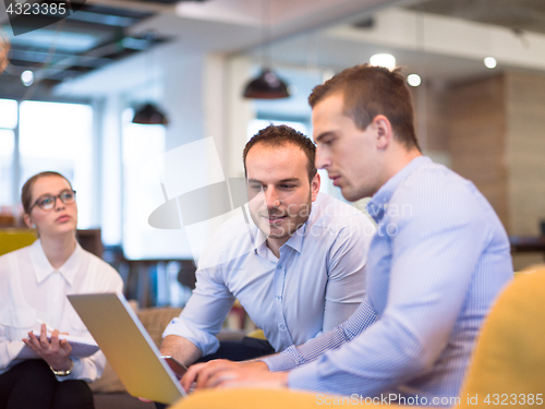 Image of Startup Business Team At A Meeting at modern office building