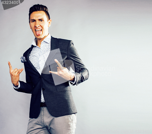 Image of young pretty businessman posing emotional on white background, l