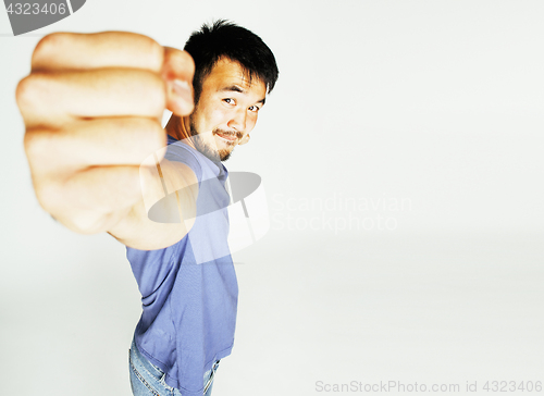 Image of young cute asian man on white background gesturing emotional, po