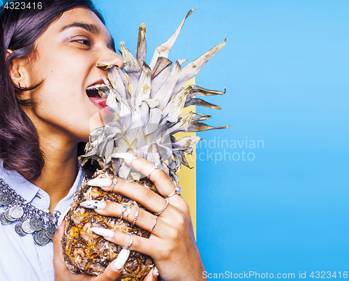 Image of lifestyle people concept. young pretty smiling indian girl with long nails wearing lot of jewelry rings, asian summer happy cool close up