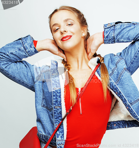 Image of young pretty teenage hipster girl posing emotional happy smiling on white background, lifestyle people concept 