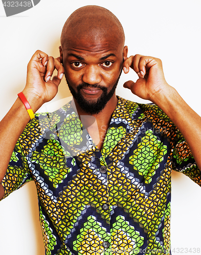 Image of portrait of young handsome african man wearing bright green nati