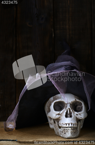 Image of Human skull with magician hat