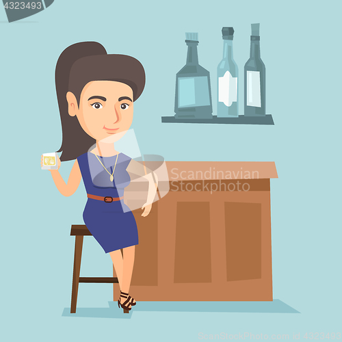 Image of Young caucasian woman sitting at the bar counter.