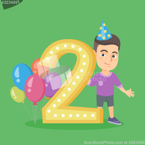 Image of Caucasian boy celebrating second birthday.