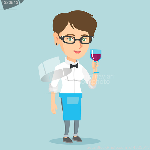 Image of Caucasian waitress holding a glass of wine.