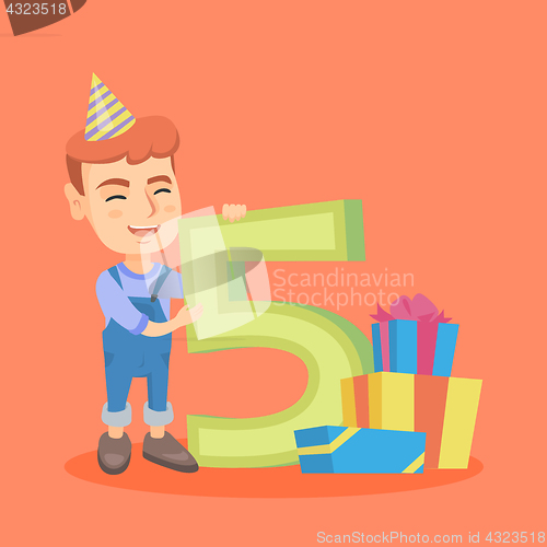 Image of Caucasian boy celebrating fifth birthday.