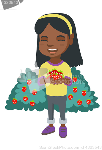 Image of African girl holding fresh strawberries in hands.