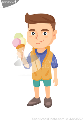 Image of Little caucasian boy holding an ice cream cone.