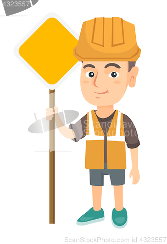 Image of Little caucasian builder boy holding road sign.