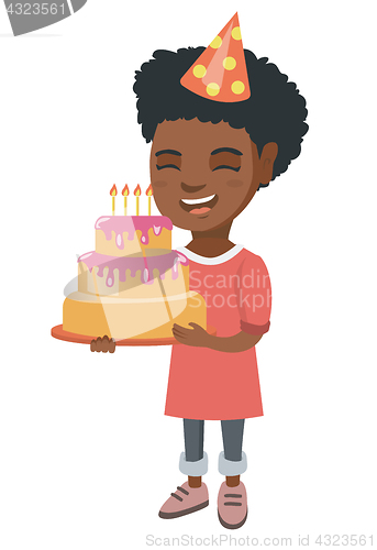 Image of African child holding birthday cake with candles.