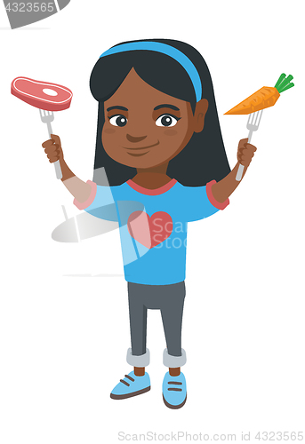 Image of Little african girl holding fresh carrot and steak