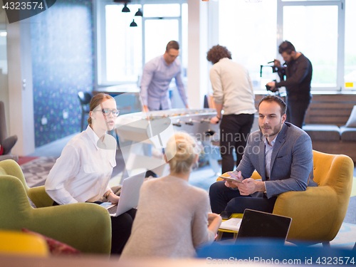 Image of Startup Business Team At A Meeting at modern office building